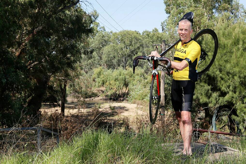 Wagga cyclicst Gethin Thomas at the end of Boorooma Street where Wagga's longest footbridge is set to be built. Picture by Les Smith