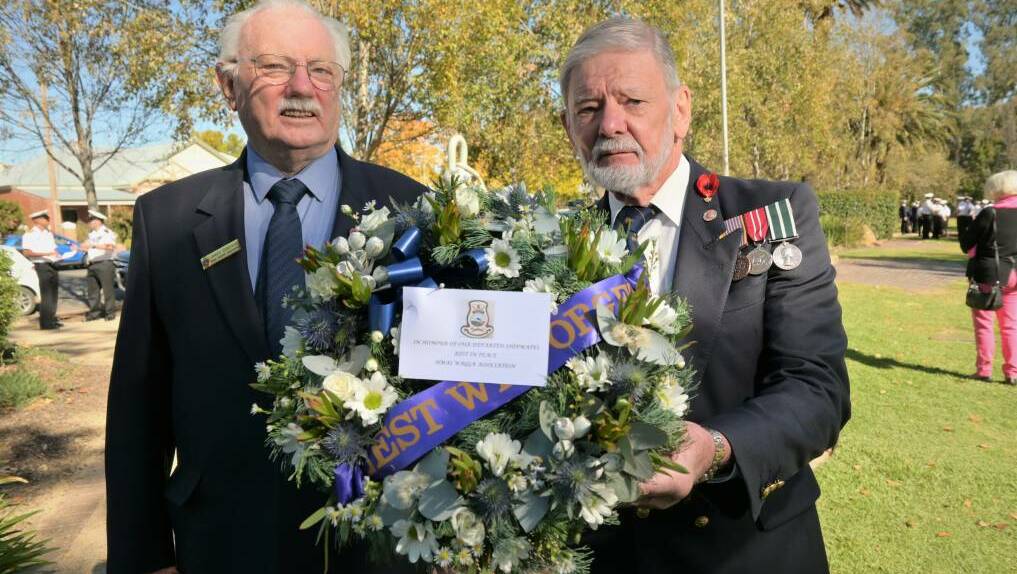 Attending a commemoration service in Wagga in 2021, James Donohue was once an ordinary seaman radar plotter 2, while David Williams served as a warrant officer marine engineer onboard the HMAS Wagga. Picture from file