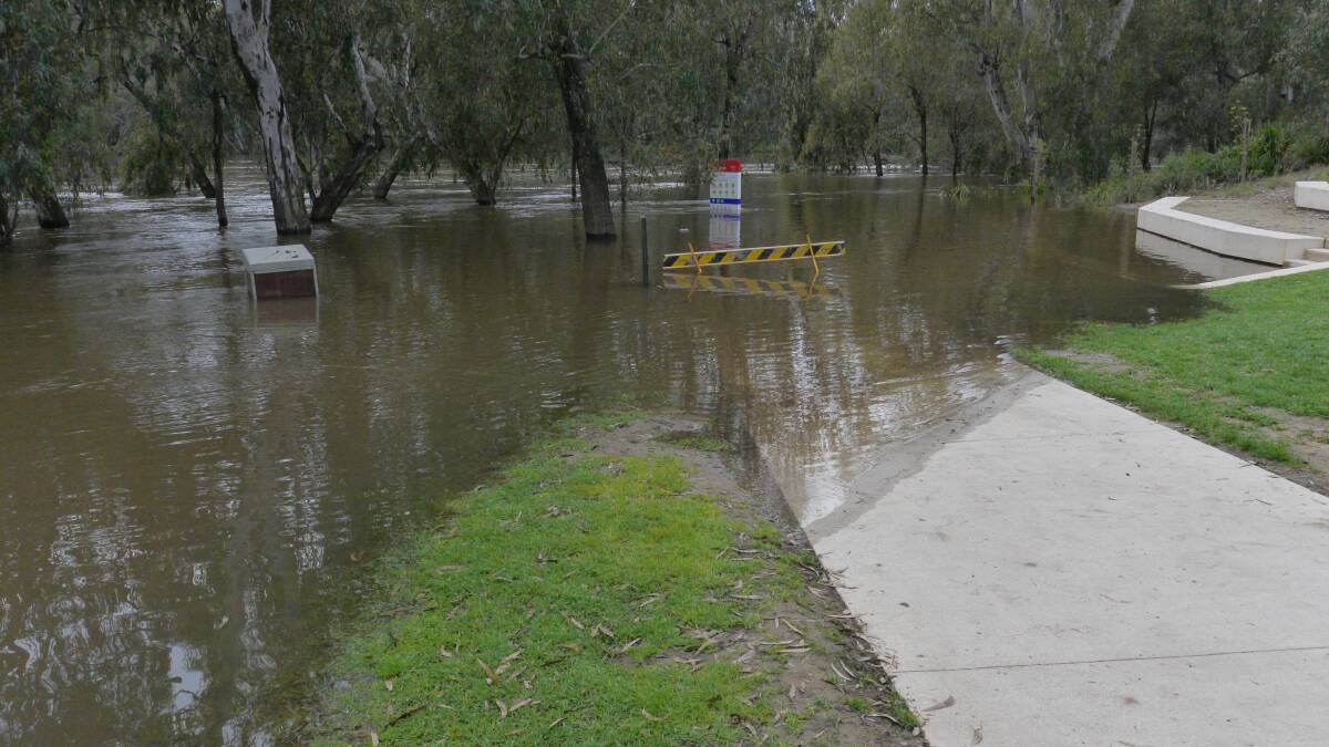 The Wagga Beach falls victim to high Murrumbidgee River levels on Tuesday morning.