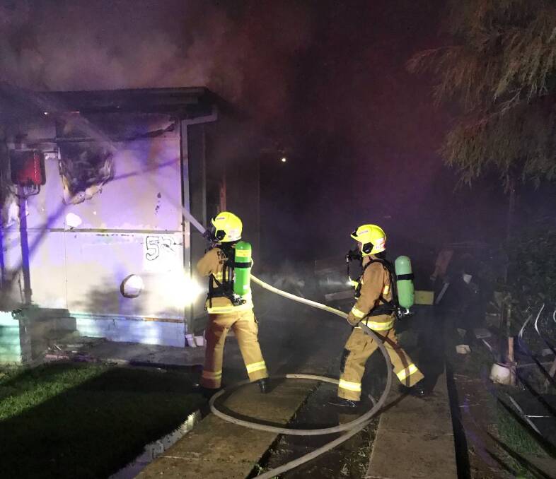 VALIANT EFFORT: Temora firefighters work hard to extinguish the Temora house fire last month. Picture: supplied.