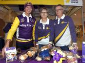 Wagga Relay For Life volunteers at the Marketplace on Saturday. Pictured (L) Alan Pottie with Connie and Michael Gordon. Picture: Les Smith 