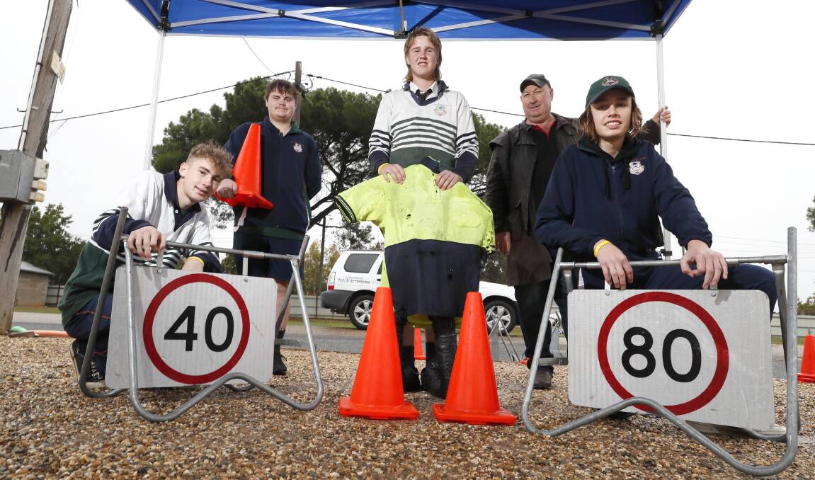 SAFETY FIRST: TRAC students Ethan Hart, Harrison Watson, Thomas Kerrisk and Dougal Howard with driving instructor Craig Prestage. Picture: Les Smith