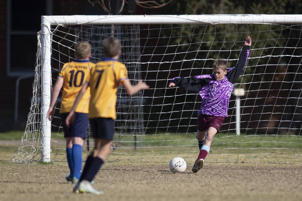 CLEARING KICK: Kooringal Public School goalie Jack Lawrence clears the ball away during their match against South Wagga Public School on Tuesday. Picture: Madeline Begley