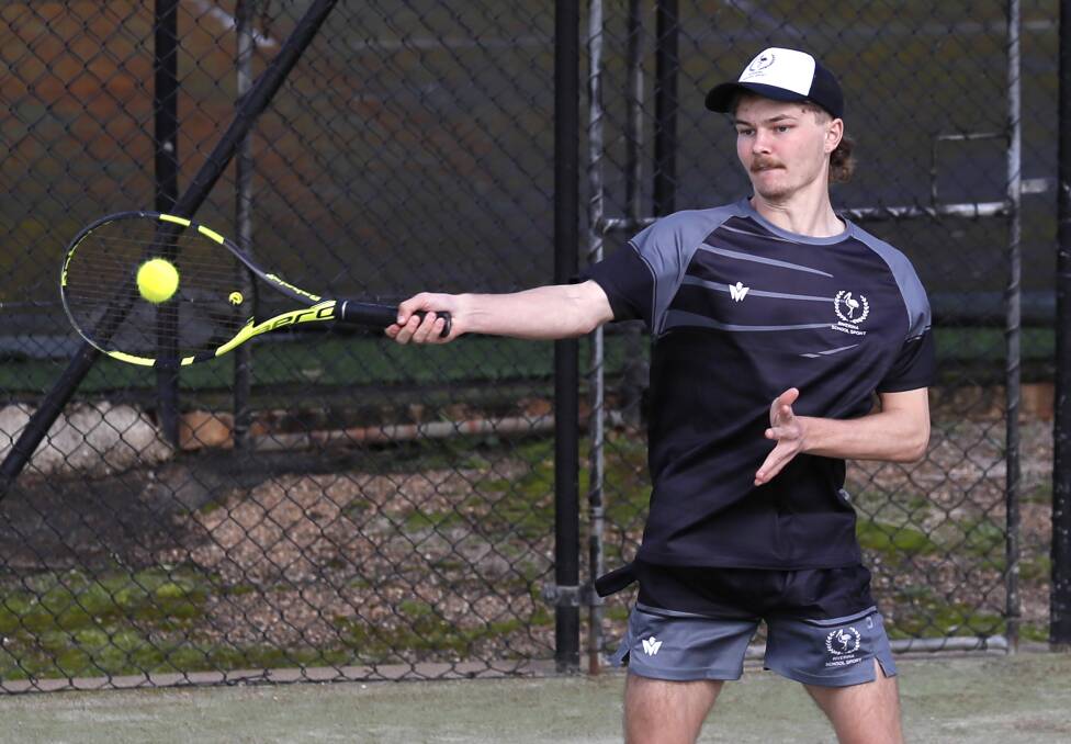 FOCUS: Riverina's Brad Callaghan gets a shot away during the NSWCHS Boys Tennis Championships held at Jim Elphick Tennis Centre during the week. Picture: Les Smith