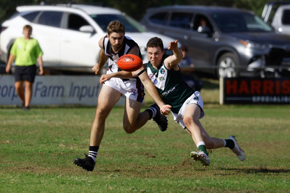 GGGM's Josh Walsh and Coolamon's Braeden Glyde battle for control of the footy during their clash at Ganmain Sportsground. Picture by Bernard Humphreys