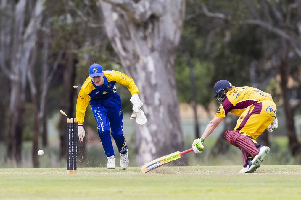 Lake Albert's Connor Bock narrowly avoids being run out by Shaun Smith during the Bulls clash against Kooringal at Rawlings Park. Picture by Ash Smith