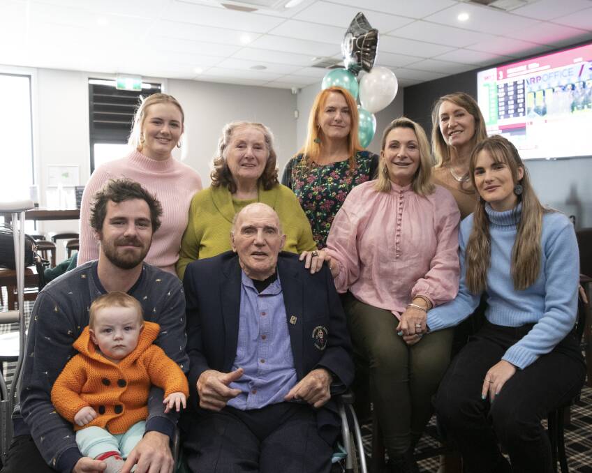 A REMARKABLE MAN: Phil Jackson with wife Ruth, grandson Sam and great-grandson Leo, granddaughters Hannah and Ellie and daughters Michelle, Susan and Lynn at his 90th birthday celebrations last month. Picture: Madeline Begley