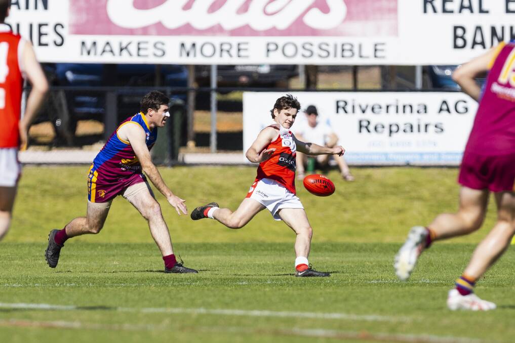 Collingullie-Glenfield Park's Tom Howard gets a kick away during the Demons' 27-point loss to GGGM at Narrandera Sportsground. Picture by Ash Smith