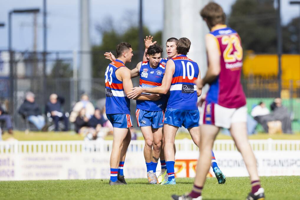 The Bulldogs celebrate a second-term goal from Ethan Weidemann in their preliminary final clash against GGGM. Picture by Ash Smith