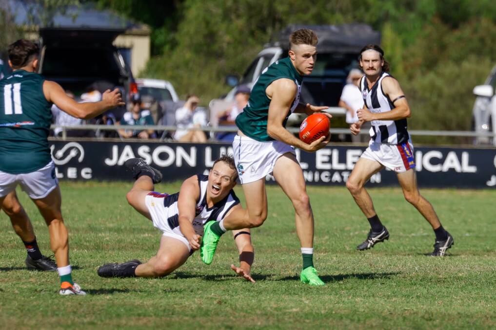 Coolamon midfielder Cooper McKelvie escapes a tackle during their clash against GGGM on Sunday. Picture by Bernard Humphreys