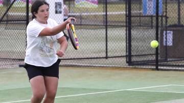 SHOT: Georgia Reid, 12, from Temora gets a shot away during the South West RMS held at Jim Elphick Tennis Centre on Sunday. Picture: Les Smith.
