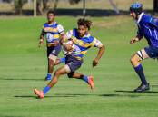 Albury's Jale Vetawa goes for a run through the middle during their clash against Waratahs. Picture by Bernard Humphreys