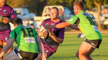 Southcity's Tim Hurst is tackled during the Bulls loss to Albury last weekend. They will travel to Junee on Sunday in search of their first win of the season. Picture by Les Smith