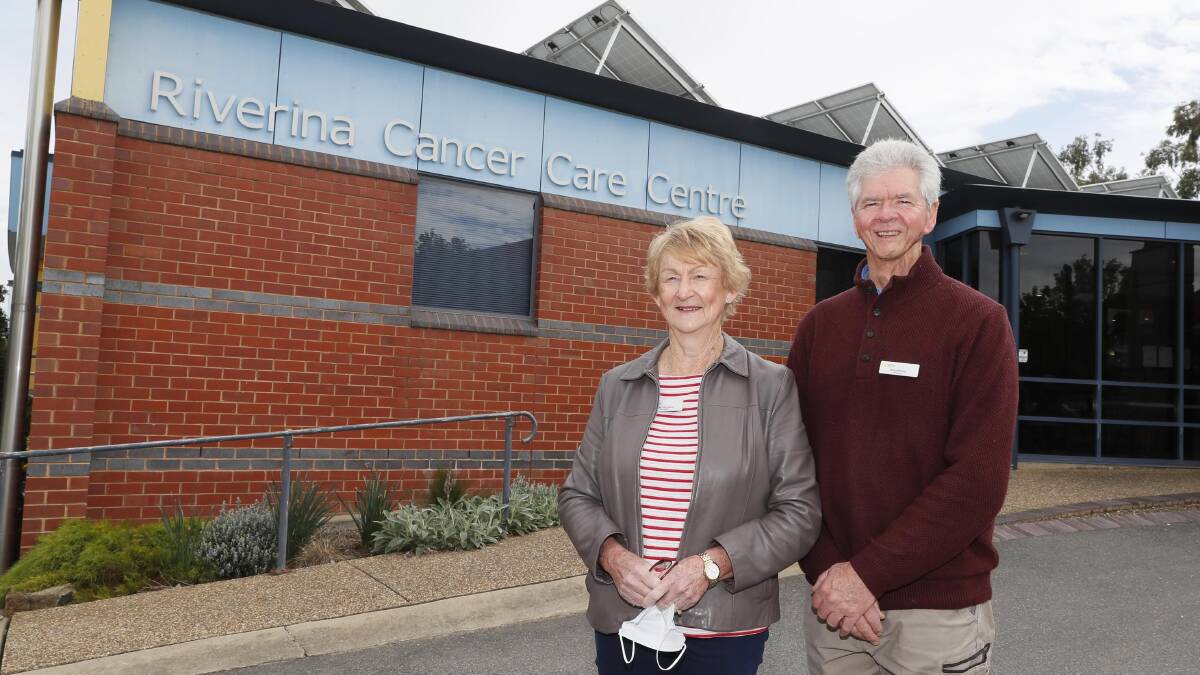 Cancer Council volunteers Judy Ferguson and Alan Pottie are happy to be back at the Riverina Cancer. Photo by Les Smith