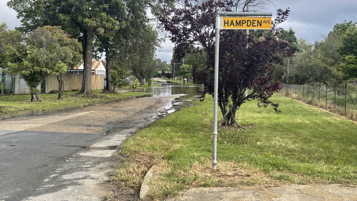 Flooding inundates Henry Street off Hampden Avenue. Picture by Taylor Dodge