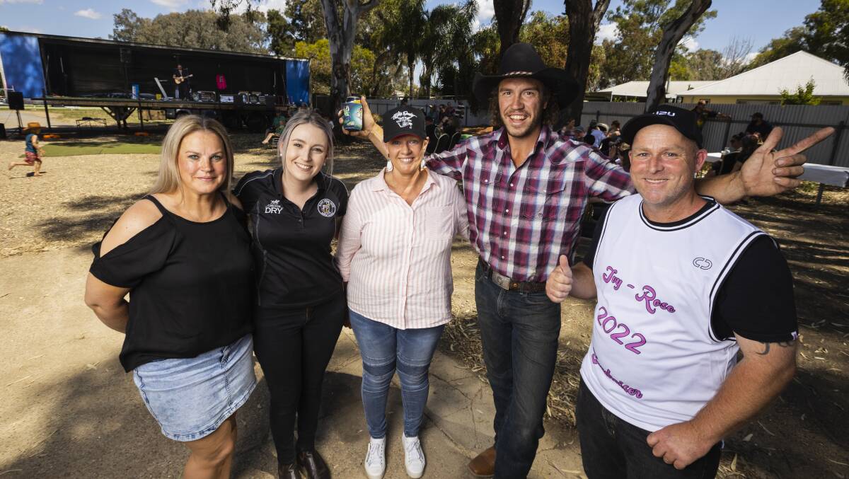 North Wagga Family Fun Day for Ivy-Rose contributors from left to right: Ivy's aunt Belinda Clarke, Black Swan manager Ellie Menz, friend Janine Hamson, Nathan 'Whippy' Griggs and Ivy's uncle Darren Clarke. Picture by Ash Smith 
