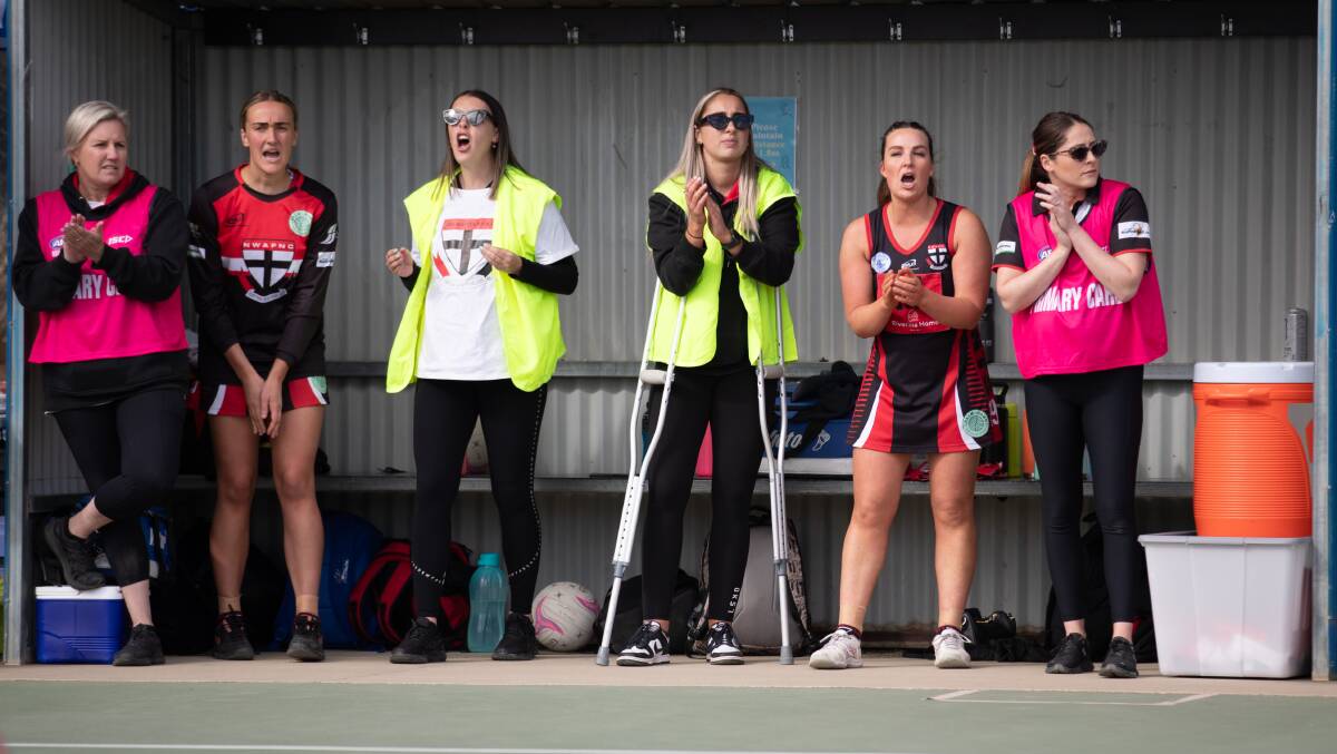 North Wagga's bench cheers for a goal during their grand final loss to Temora on Saturday. Picture by Madeline Begley