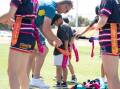 Former NRL and rugby union player Mark Gasnier introduces children including Griffith's Austin Cook, 6, to the game he has created, tri tag rugby, in a session at Parramore Park. Picture by Madeline Begley