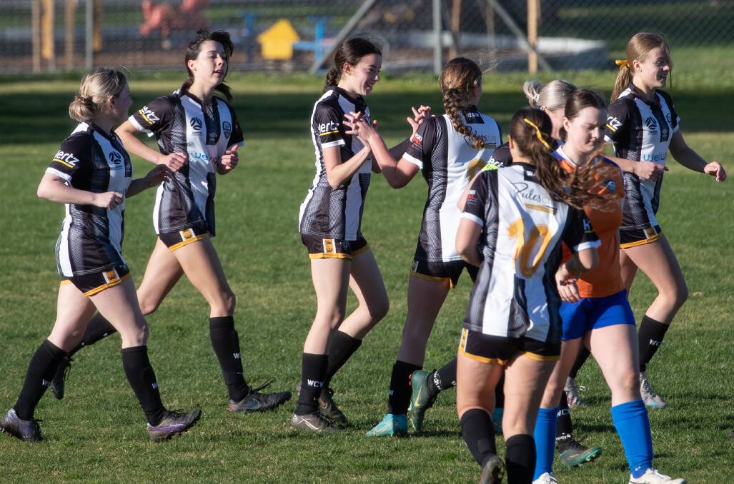 Wagga City Wanderers players celebrate a goal at Gissing Oval during the 2023 season. Picture by Madeline Begley
