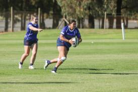 Vanessa Harris plays the ball for Waratahs in their smashing of Wagga City. Picture by Tom Dennis
