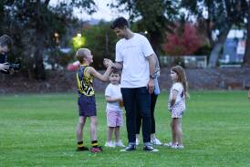 Trent Cotchin stops by Ganmain-Grong Grong-Matong junior training at Anderson Oval. Picture by Bernard Humphreys