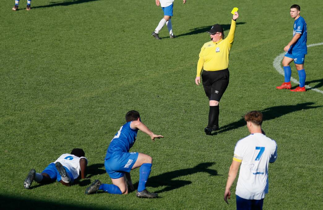 Football Wagga referee Catherine Nash issues a yellow card during the 2023 Pascoe Cup grand final. Picture by Les Smith