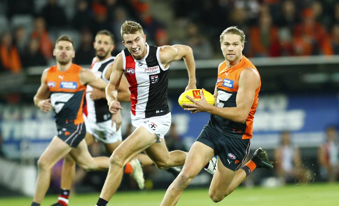 Dougal Howard chases Harry Himmelberg during a St Kilda, GWS game. The duo are two of eight ex-Riverina players to be selected in the 2022 NSW state of origin team. Picture by Keegan Carroll