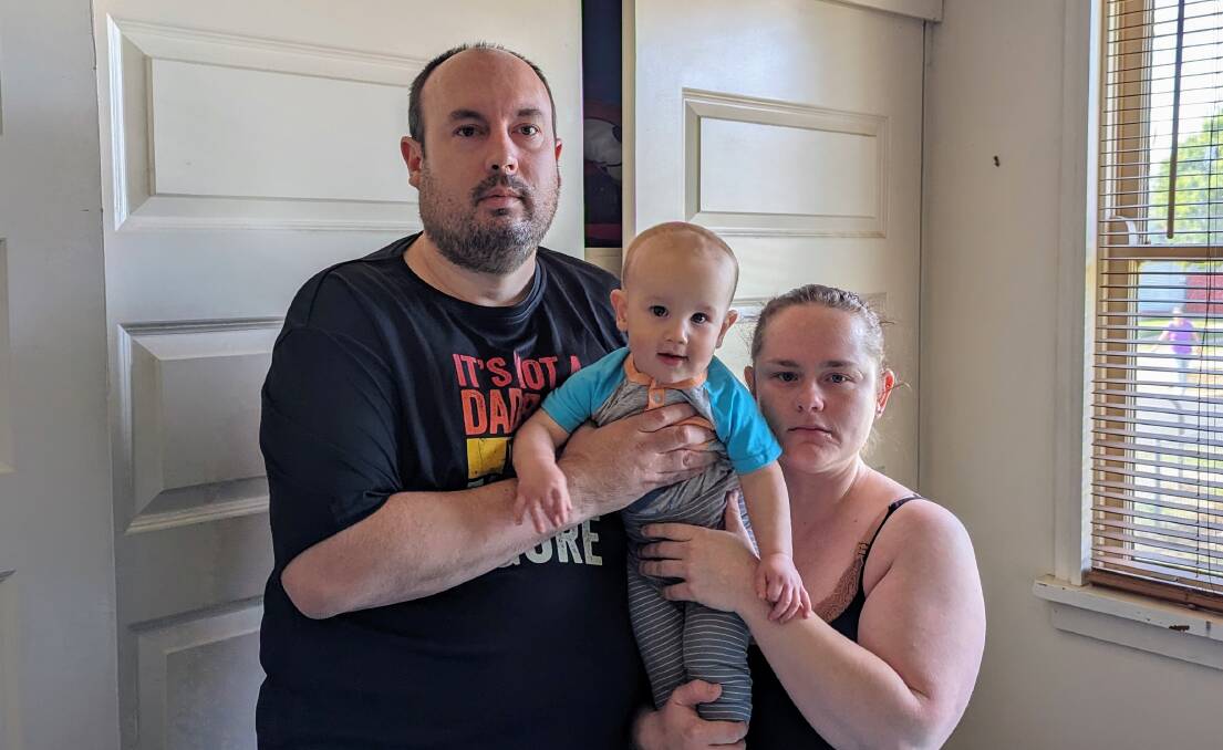 Jason and Tori Lipscombe, with baby Myles, are scared for their health due to the mould in their Ashmont home. Picture by Dan Holmes