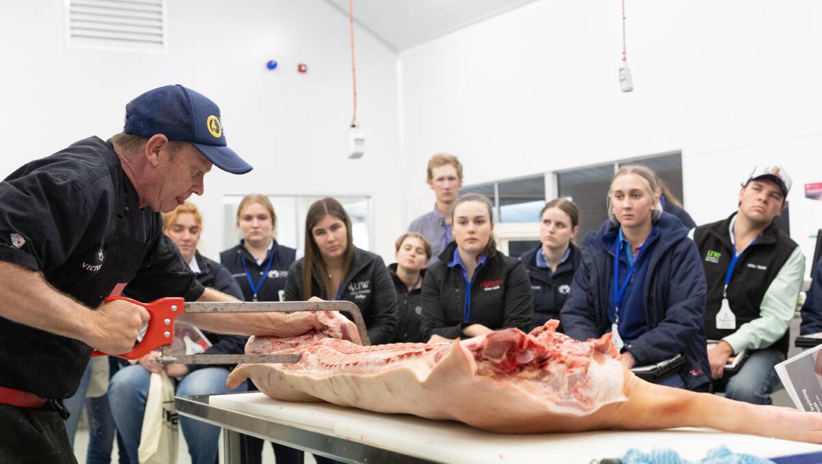 Butcher Shannon Walker leads a pork carcass utilisation workshop at the Australian Intercollegiate Meat Judging Association national conference yesterday. Picture by Madeline Begley