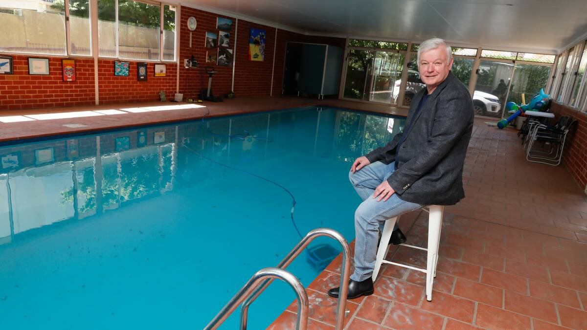 Ed Wellham heats his pool to 28 degrees using solar energy and a heat pump. Picture by Les Smith