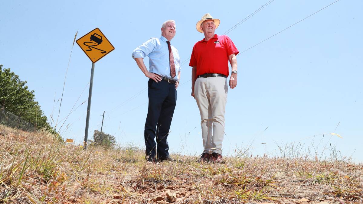 Michael McCormack and former Wagga mayor Greg Conkey announce Dunns Road upgrades in 2019. File picture
