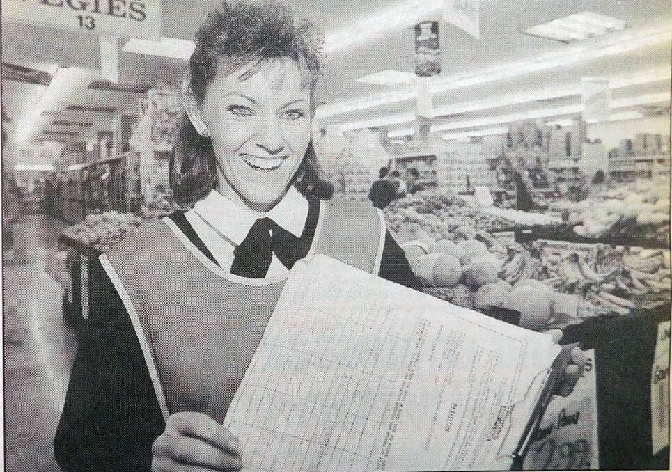 WORKING SOLUTION: Mandy Hale from Cannons Food Barn with a petition to lift Sunday trading restrictions in the mid-1990s. Picture: Daily Advertiser