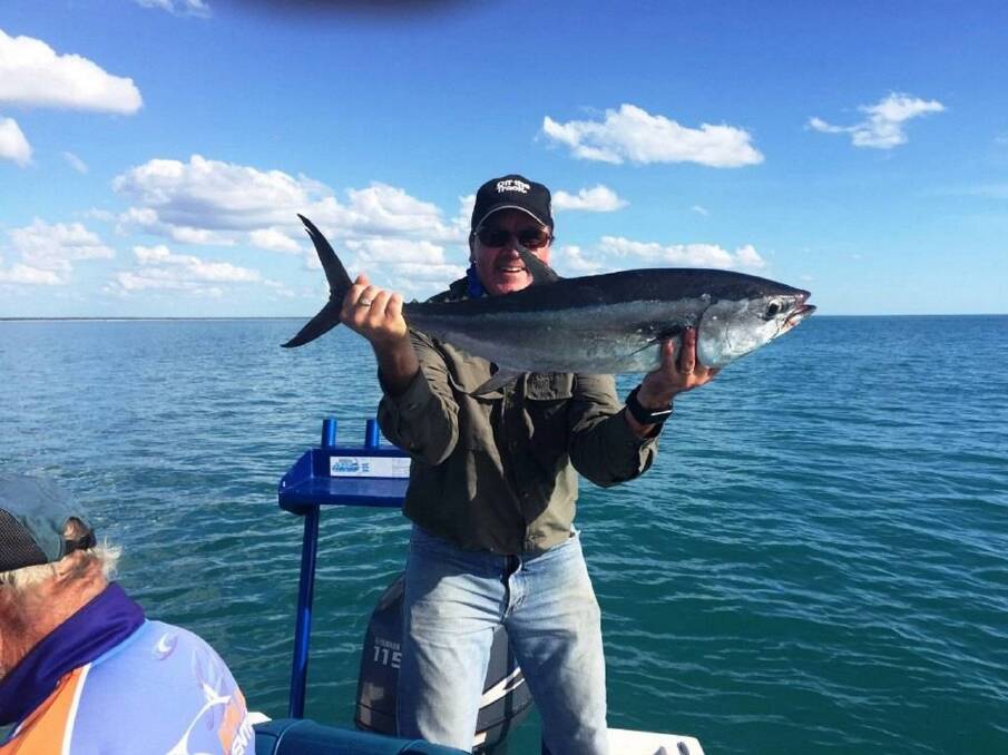 TUNA TIME: Scott Finemore is pictured here with a top tuna he landed off Weipa in the Gulf of Carpentaria. What a beaut!