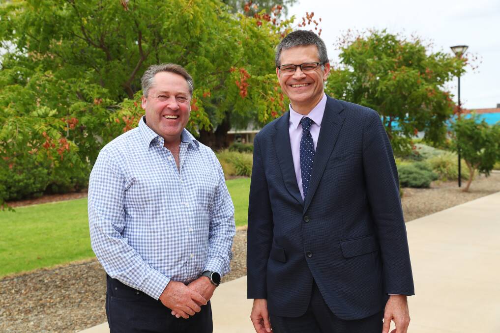 WELL PLACED: Standing Committee on Agriculture and Water Resources, chairman Rick Wilson with Charles Sturt Vice-Chancellor Professor Andrew Vann in Wagga. Picture: Emma Hillier