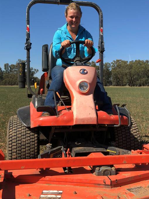 IN THE DRIVER'S SEAT: Wagga Polocrosse Club secretary Katie Peeck test drives the club's new mower at Euberta. Picture: Nikki Reynolds