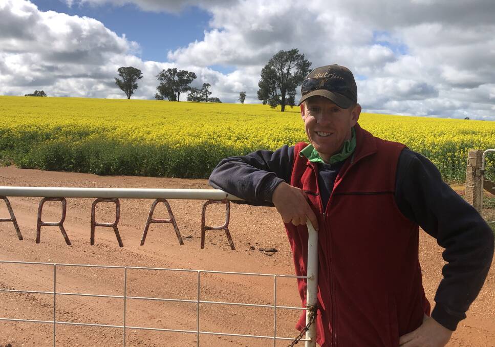PADDOCK SUCCESS: Ben Langtry of "Marrarvale", pictured with the canola crop in the background. Picture: Nikki Reynolds