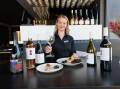 The Charles hospitality staff member Rosie Cannon with locally sourced food and Eden Road wines ahead of their special collaborative Wine Evening. Picture by Les Smith