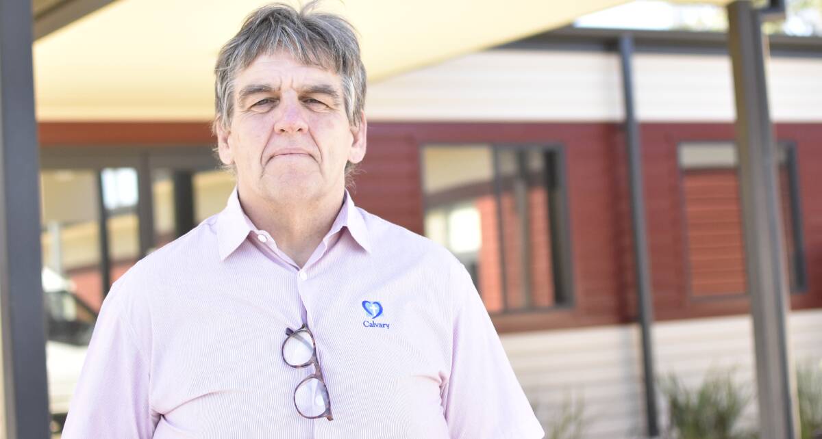 FULL TO BURSTING: Calvary manager Brendan McCorrey says his clinic is "constantly" overbooked, with month-long queues for people seeking care. Picture: Kenji Sato