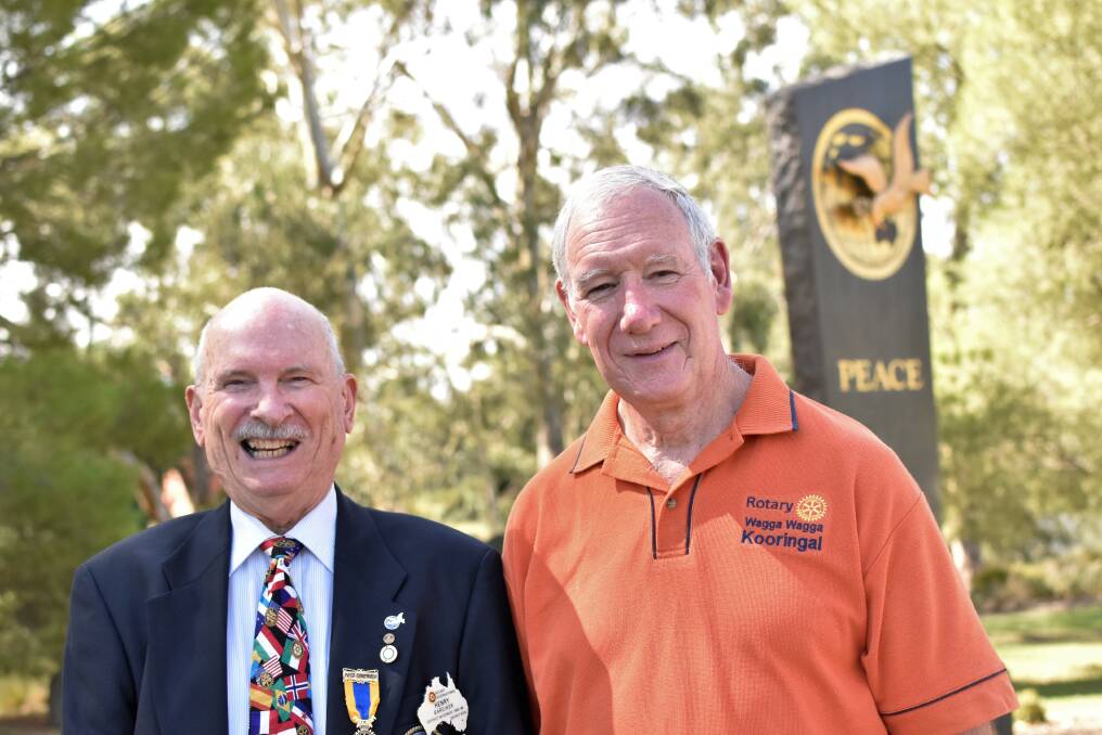PUSHING FOR PEACE: Dr Henry Gardiner and Phillip Tome are Rotarians who are pushing for world peace. They say the place to start is at the home. Picture: Kenji Sato