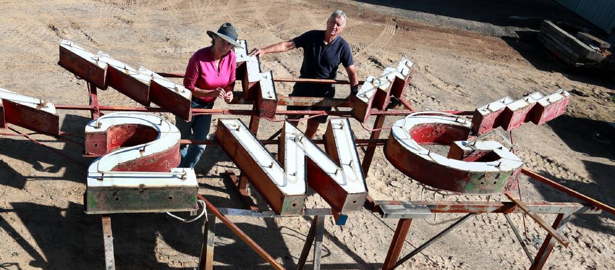 SIGN OF THE TIMES: Jan and Brian Hay will spend the coming months meticulously repairing the iconic 2WG by hand. Picture: Les Smith