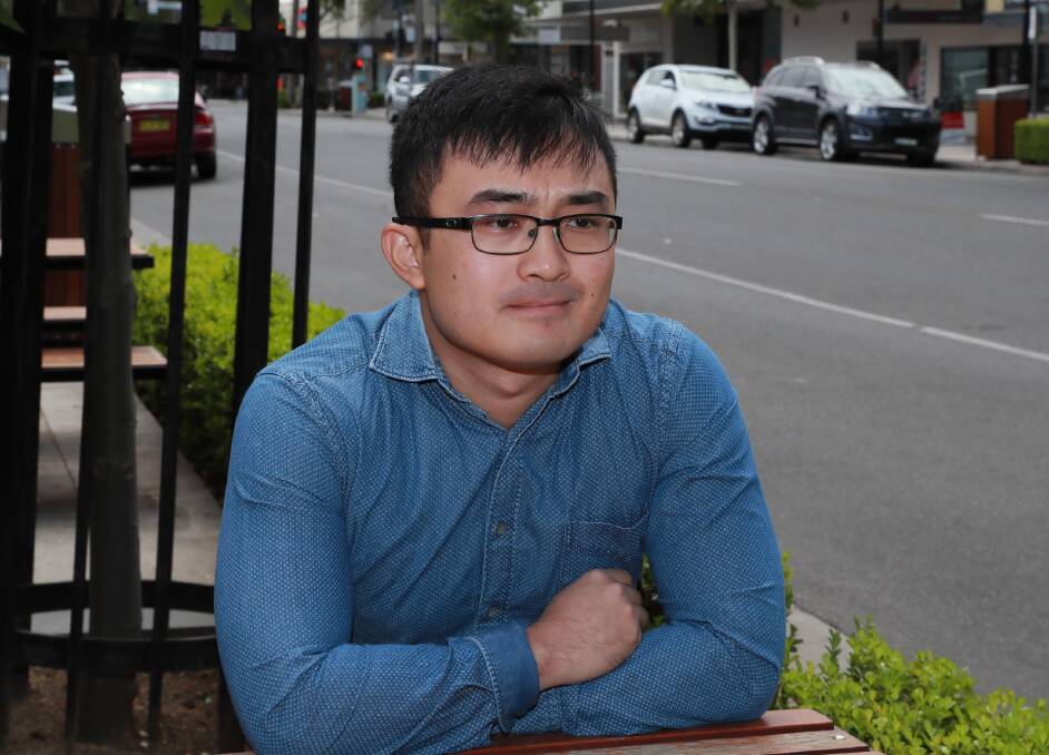 HURT: Daily Advertiser reporter Kenji Sato copped racial abuse and profanities while he was shopping in Sturt Mall last week. Picture: Les Smith