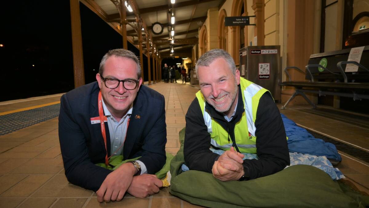 SNUG: NSW Trainlink chief executive Pete Allaway and Tom Grosskopf. Picture: Kenji Sato