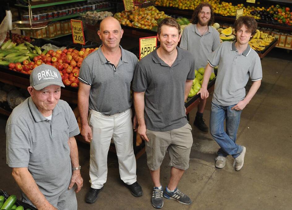ROOTS IN FRUIT: Wagga Fruit Supply founder Angelo Papasidero, pictured in 2017 with son Robert Papasidero and grandsons Steve, Nicholas and Jonathan. Picture: Laura Hardwick 