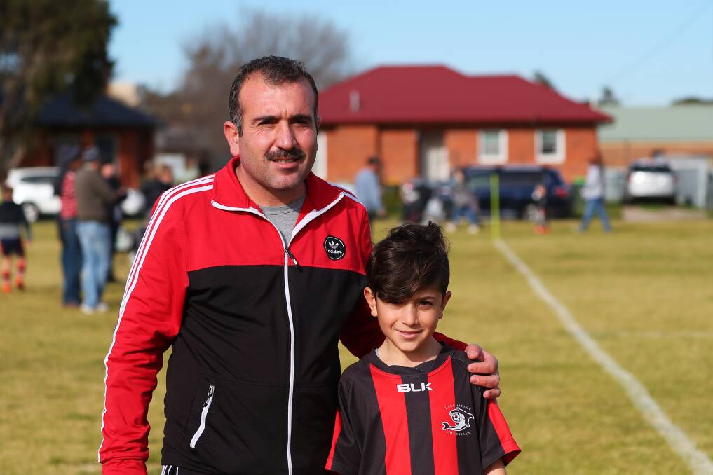 FOOTBALL FANATICS: Falah Kheder and Sultan Hasan are playing soccer in Australia for the first time ever. Picture: Emma Hillier
