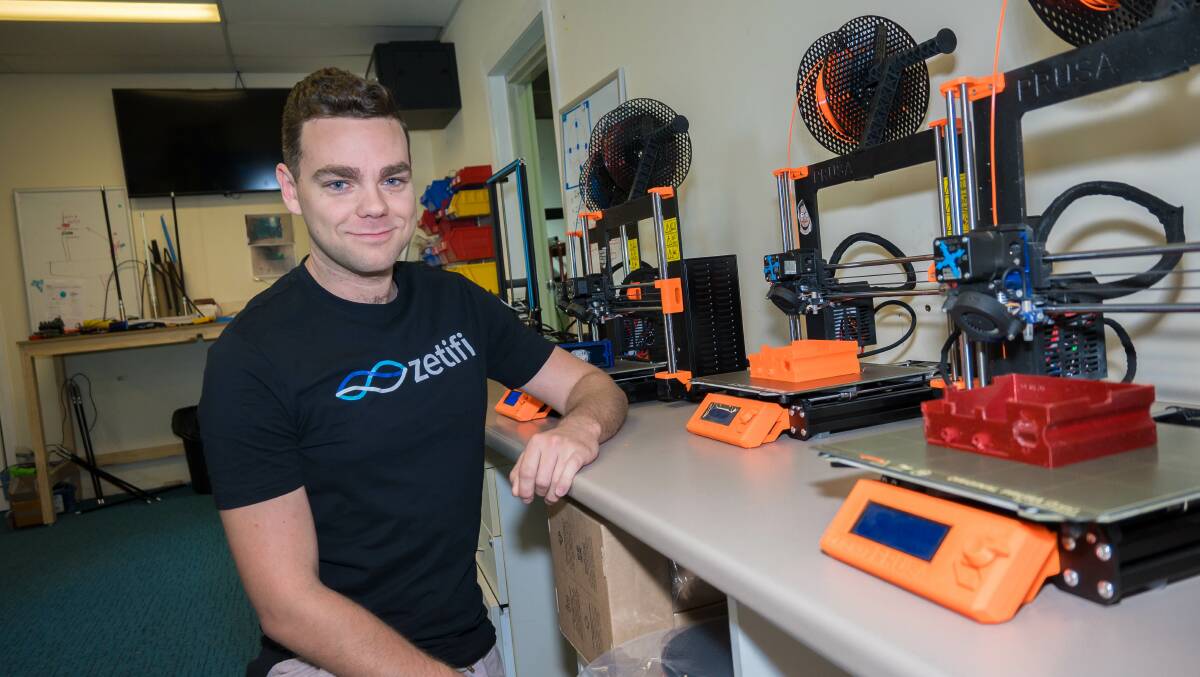 DATA GUY: Software engineer Ben Letchford with some 3D printing machines that were bought with grant from Wagga City Council. Picture: Kenji Sato
