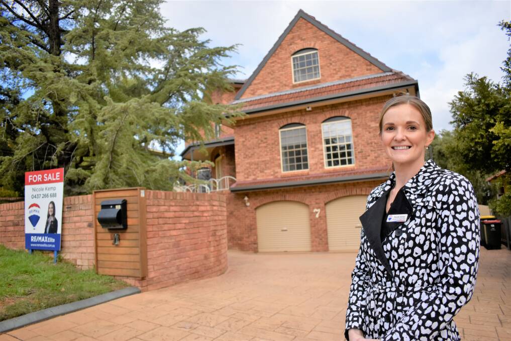 BACK IN BUSINESS: Real estate agent Nicole Kemp is glad to be back at work after nearly two months of restrictions. Picture: Kenji Sato