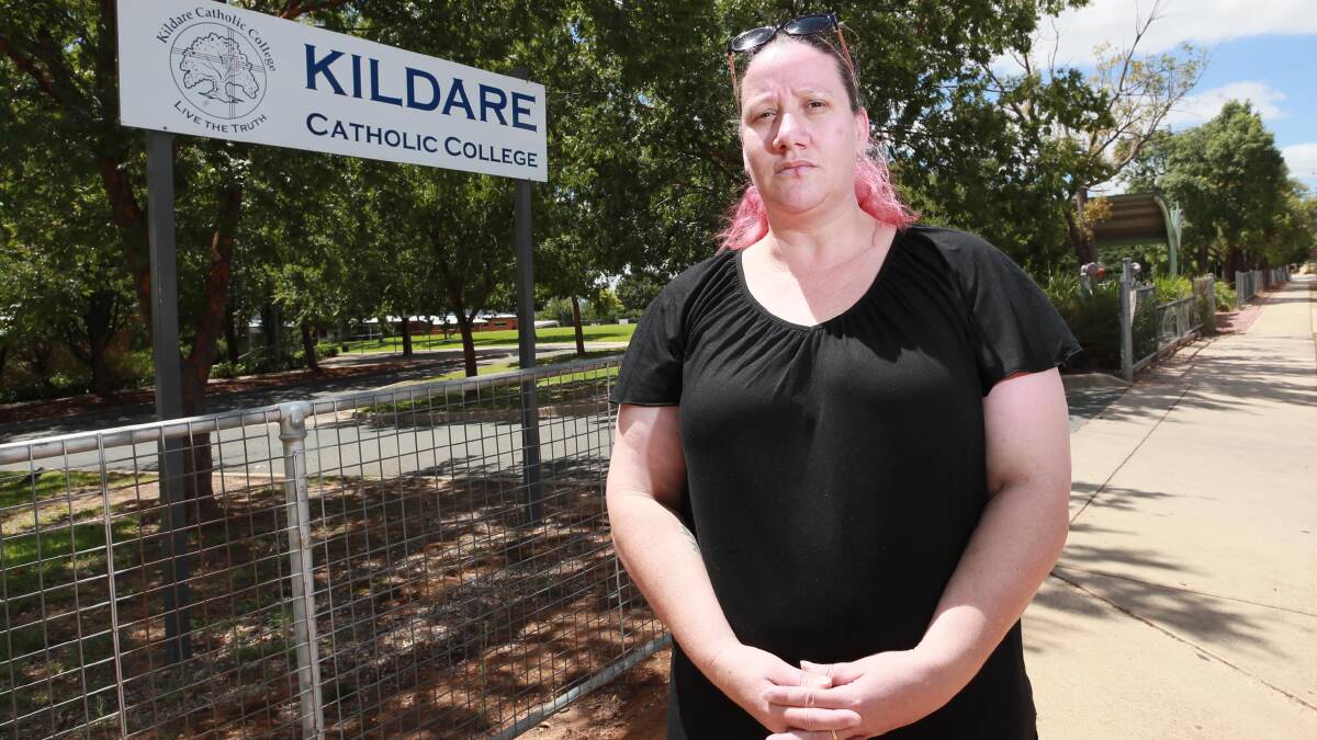BROKEN PROMISES: Rebecca Jerrick says she was promised fee relief from Kildare Catholic College, but is now being hounded by debt collectors. Picture: Les Smith