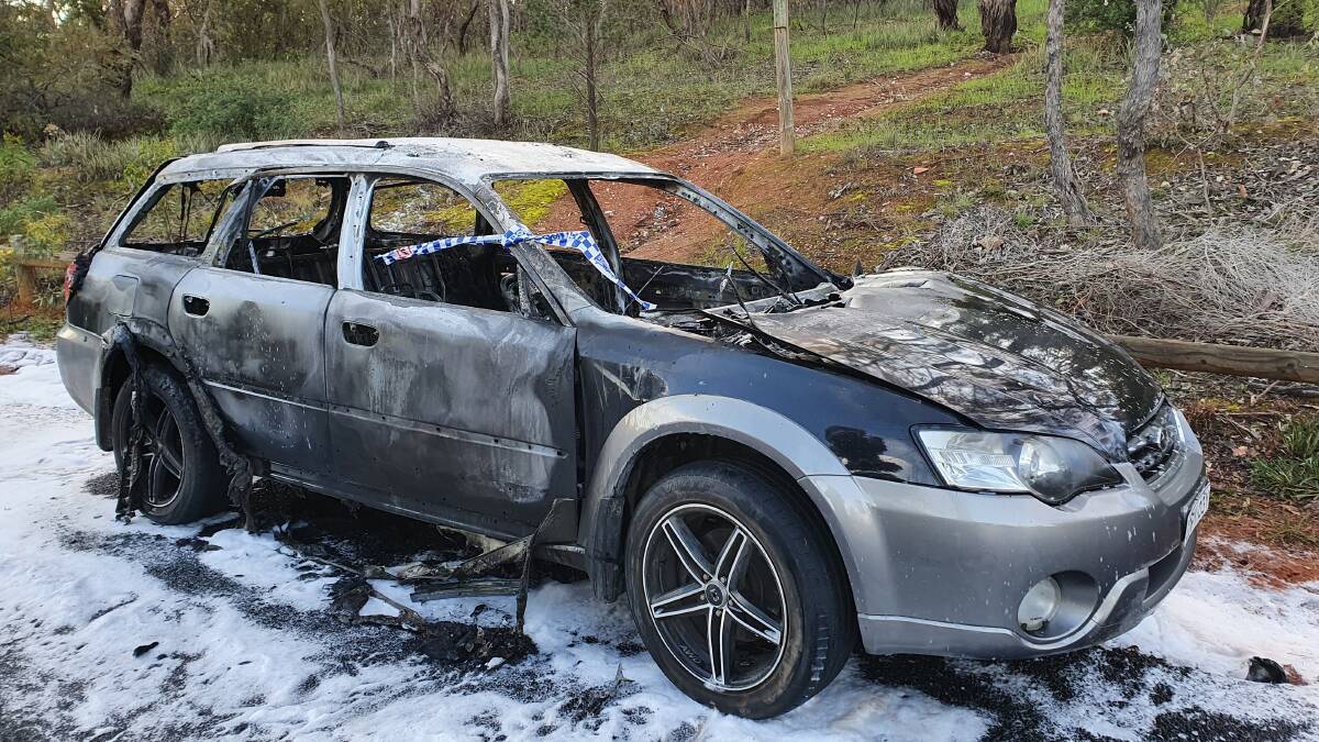 The car was dumped and set on fire within the space of 30 minutes. Picture: Kenji Sato