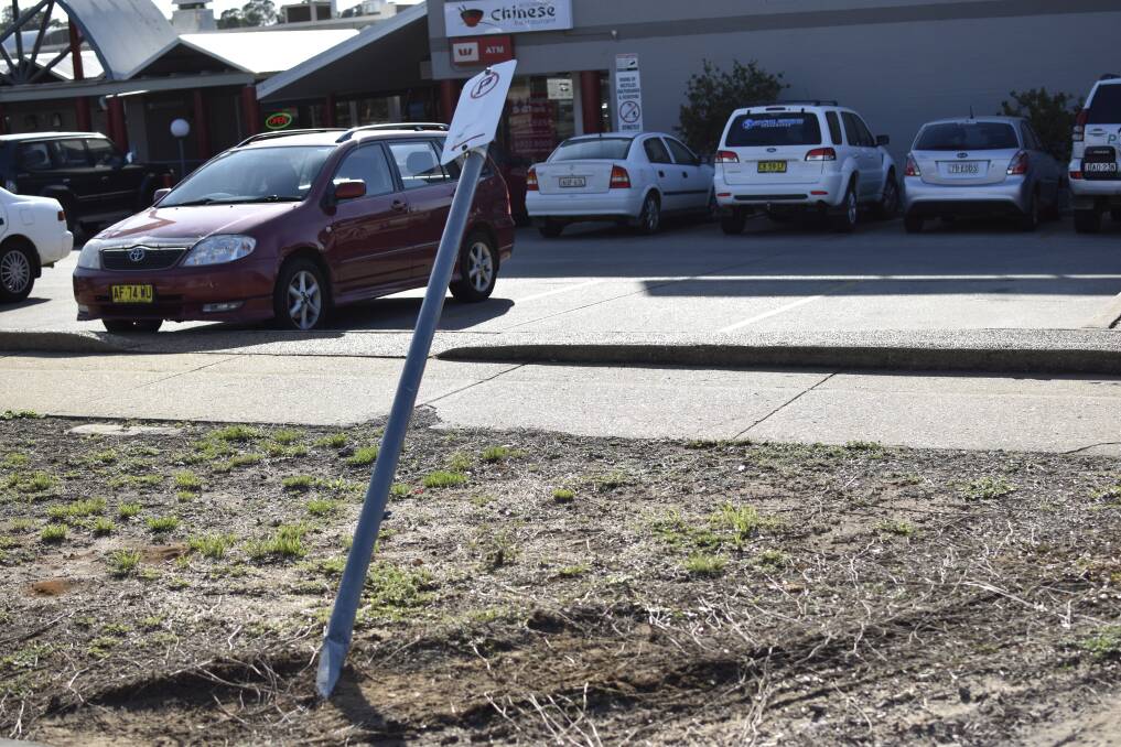 A signpost was driven over outside of Kooringal Mall. Picture: Kenji Sato