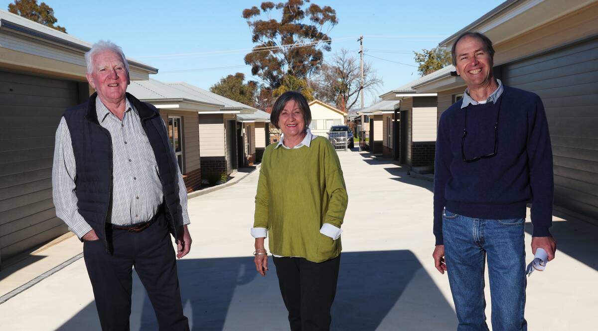 HOME STRETCH: Brian and Lyn Quigley and William Adlong are looking forward to welcoming in ten new residents into Abbeyfield House. Picture: Emma Hillier
